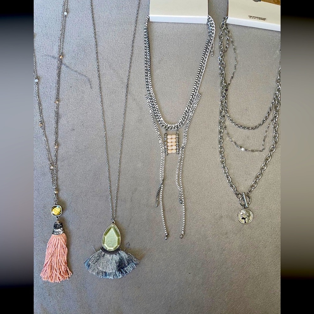 Set of four silver necklaces from Buckle